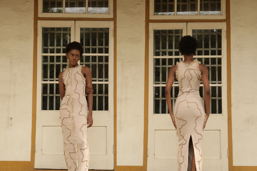 Y'WANDELAG Signature motif